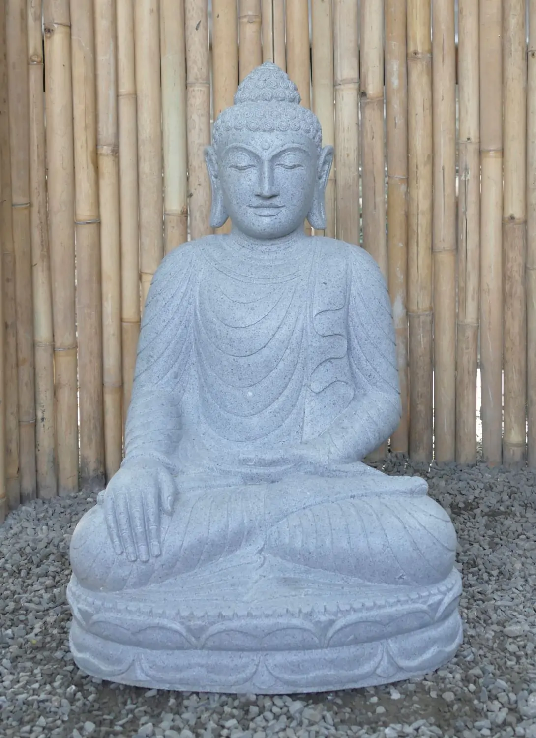  Product image 1 of the product “Seated Buddha made of Riverstone in Bhumisparsha - gesture of touching the earth. 82cm height. ”